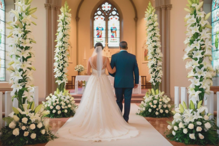 The entrance of a church beautifully decorated for a wedding. The aisle is adorned with white flowers and wedding details, creating a romantic and solemn atmosphere. In the background, with their backs to the camera, stands a bride on her father's arm. They are both looking straight ahead, with the bride wearing a stunning wedding gown, with a long train trailing behind her. Soft light filters through the church windows, gently illuminating the scene and creating a sense of anticipation. The atmosphere is calm, solemn, and filled with emotion, capturing the moment before walking down the aisle.